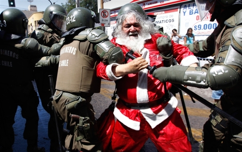 a-demonstrator-dressed-as-santa-claus.jpg?w=500&h=313